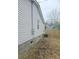 Vinyl siding, a window, and an AC unit in the backyard at 161 Stratton Dr, North Charleston, SC 29420
