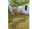 Backyard features a freshly stained wooden deck and newly installed siding at 161 Stratton Dr, North Charleston, SC 29420
