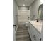 Modern bathroom with white vanity, dual sinks, and a shower/tub combo at 161 Stratton Dr, North Charleston, SC 29420