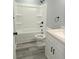 Bathroom with new tub, toilet, vanity, and flooring at 161 Stratton Dr, North Charleston, SC 29420