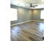 Spacious bedroom with ceiling fan and hardwood floors at 161 Stratton Dr, North Charleston, SC 29420