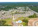 Aerial view of a new home community with a lake and pool at 1655 Siloh St # 488, Mount Pleasant, SC 29466