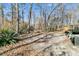 Large backyard with wooded area and deck at 174 Winding Rock Rd, Goose Creek, SC 29445