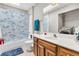 Bathroom with tub, shower, and laundry area at 174 Winding Rock Rd, Goose Creek, SC 29445
