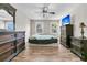 Bright bedroom with hardwood floors, a ceiling fan, and ample dresser space at 174 Winding Rock Rd, Goose Creek, SC 29445