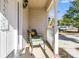 Cozy front porch with seating and white railings at 174 Winding Rock Rd, Goose Creek, SC 29445