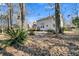 Two-story house back with deck and backyard at 174 Winding Rock Rd, Goose Creek, SC 29445