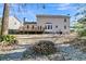 Two-story house back with deck and fire pit at 174 Winding Rock Rd, Goose Creek, SC 29445