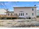 Two-story house back with deck and fenced yard at 174 Winding Rock Rd, Goose Creek, SC 29445