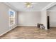 Spacious living room with hardwood floors and large window at 174 Winding Rock Rd, Goose Creek, SC 29445