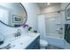 Bathroom features a navy vanity, marble countertop and bathtub at 178 Wappoo Trace Ln, Summerville, SC 29486