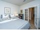 Spacious bedroom with a king-size bed and access to hallway at 178 Wappoo Trace Ln, Summerville, SC 29486