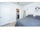 Bedroom with en-suite bathroom and gray bedding at 178 Wappoo Trace Ln, Summerville, SC 29486