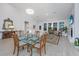 Elegant dining area with a glass-top table and comfortable seating for six at 178 Wappoo Trace Ln, Summerville, SC 29486