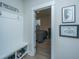 Bright entryway with built-in bench and shoe storage, offering access to a bedroom at 178 Wappoo Trace Ln, Summerville, SC 29486