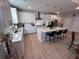 Modern kitchen with white cabinets, quartz countertops, and island at 178 Wappoo Trace Ln, Summerville, SC 29486