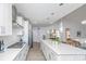 Modern kitchen with white cabinets, quartz countertops, and stainless steel appliances at 178 Wappoo Trace Ln, Summerville, SC 29486
