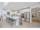 Modern kitchen with white cabinets, quartz countertops, and stainless steel appliances at 178 Wappoo Trace Ln, Summerville, SC 29486
