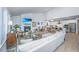 Open living space with a fireplace and views into the kitchen and dining area at 178 Wappoo Trace Ln, Summerville, SC 29486