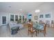 Open floor plan living and dining area with hardwood floors and ample natural light at 178 Wappoo Trace Ln, Summerville, SC 29486