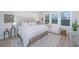 Main bedroom with plush bed, window seat, and neutral color palette at 178 Wappoo Trace Ln, Summerville, SC 29486