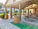 Covered outdoor pavilion with picnic tables and a grilling area at 203 Oak View Way, Summerville, SC 29483