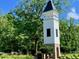 Community entrance with a charming white tower at 203 Oak View Way, Summerville, SC 29483