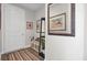 Inviting entryway with wood floors and storage bench at 203 Oak View Way, Summerville, SC 29483