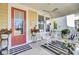 Relaxing front porch with white rocking chairs and a cheerful atmosphere at 203 Oak View Way, Summerville, SC 29483