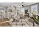 Sunlit living room with hardwood floors and comfortable seating at 203 Oak View Way, Summerville, SC 29483