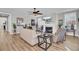 Spacious living room with hardwood floors, fireplace and comfortable furniture at 203 Oak View Way, Summerville, SC 29483