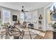 Cozy living room featuring hardwood floors and ceiling fan at 203 Oak View Way, Summerville, SC 29483
