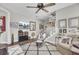 Relaxing living room with hardwood floors and a view of the staircase at 203 Oak View Way, Summerville, SC 29483