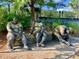 Three bronze statues situated in a landscaped area at 203 Oak View Way, Summerville, SC 29483