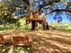 Large treehouse with slide and benches at 203 Oak View Way, Summerville, SC 29483