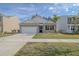 Two-story home with brick facade and attached garage at 219 Greenwich Dr, Summerville, SC 29486