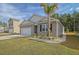 Eye-level view of charming house with palm tree at 219 Greenwich Dr, Summerville, SC 29486
