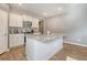 White kitchen island with granite countertop at 219 Greenwich Dr, Summerville, SC 29486