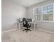 Home office with corner desk and comfortable chair at 219 Greenwich Dr, Summerville, SC 29486