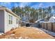 Large backyard with wooden fence and partial snow cover at 221 Rubles Ln, Moncks Corner, SC 29461
