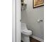 Simple, clean bathroom with toilet and wood floor at 221 Rubles Ln, Moncks Corner, SC 29461