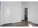 Simple bedroom with white doors and wood-look flooring at 221 Rubles Ln, Moncks Corner, SC 29461