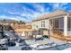 Backyard deck with seating area and grill, overlooks fenced yard at 221 Rubles Ln, Moncks Corner, SC 29461