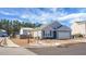 Gray siding house with a two-car garage and small front yard at 221 Rubles Ln, Moncks Corner, SC 29461