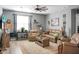 Cozy living room with taupe leather furniture and a neutral rug at 221 Rubles Ln, Moncks Corner, SC 29461