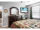Main bedroom featuring a dresser and a large TV at 221 Rubles Ln, Moncks Corner, SC 29461