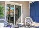 Cozy patio with wicker chairs and sliding glass door access at 221 Rubles Ln, Moncks Corner, SC 29461