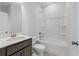 Bathroom with a dark wood vanity, white toilet, and a shower-tub combination, offering essential amenities at 349 Blue Oak Dr, Moncks Corner, SC 29461