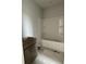 Bathroom featuring a bathtub and dark vanity at 349 Blue Oak Dr, Moncks Corner, SC 29461