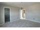 Unfinished bedroom featuring neutral walls, white trim, and doorways leading to other rooms at 349 Blue Oak Dr, Moncks Corner, SC 29461